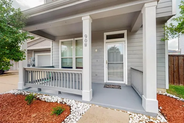 a view of porch with a bench in dining room