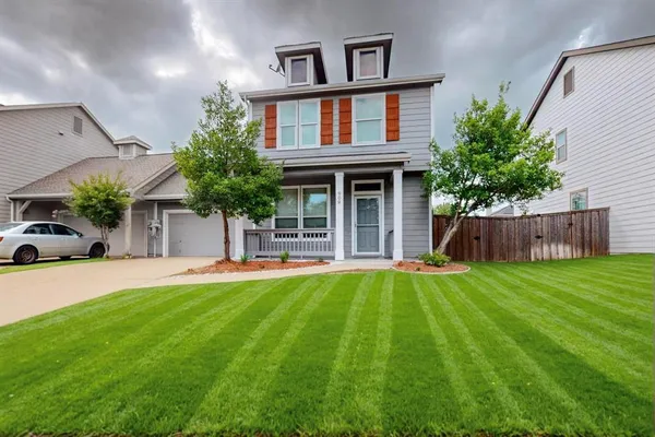 a house view with a garden space