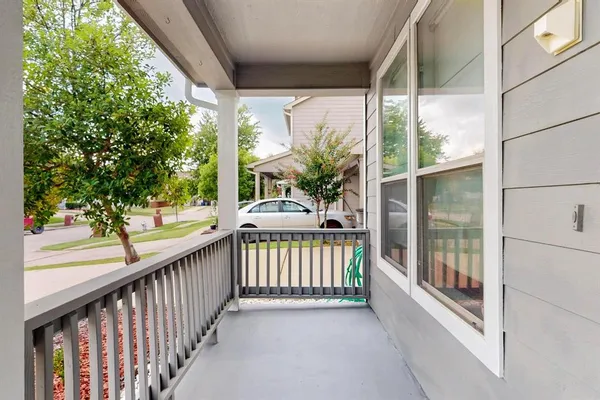 a view of porch with small garden