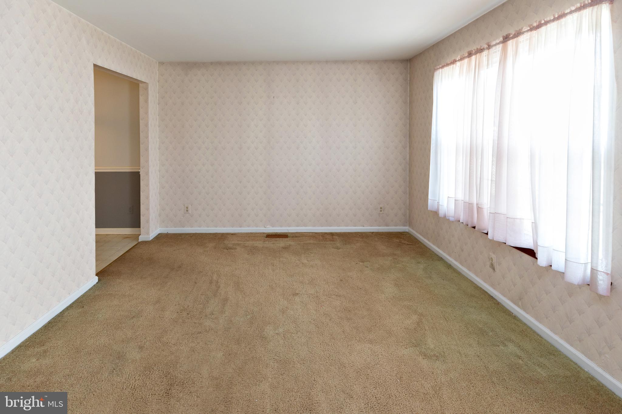 322 West Washington Avenue Magnolia, NJ 08049 - Photo 15 of 28 an empty room with a empty space and window