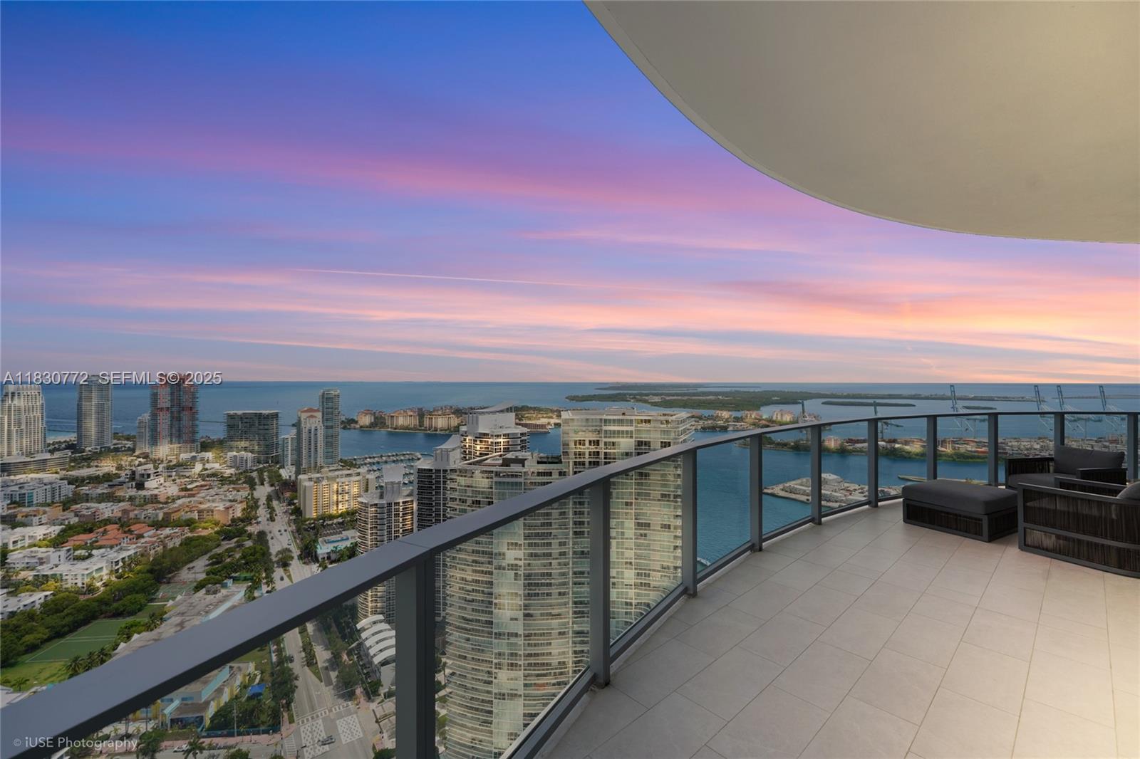 500 Alton Road, Unit 4401 Miami Beach, FL 33139 - Photo 21 of 34 a view of a city skyline from a balcony
