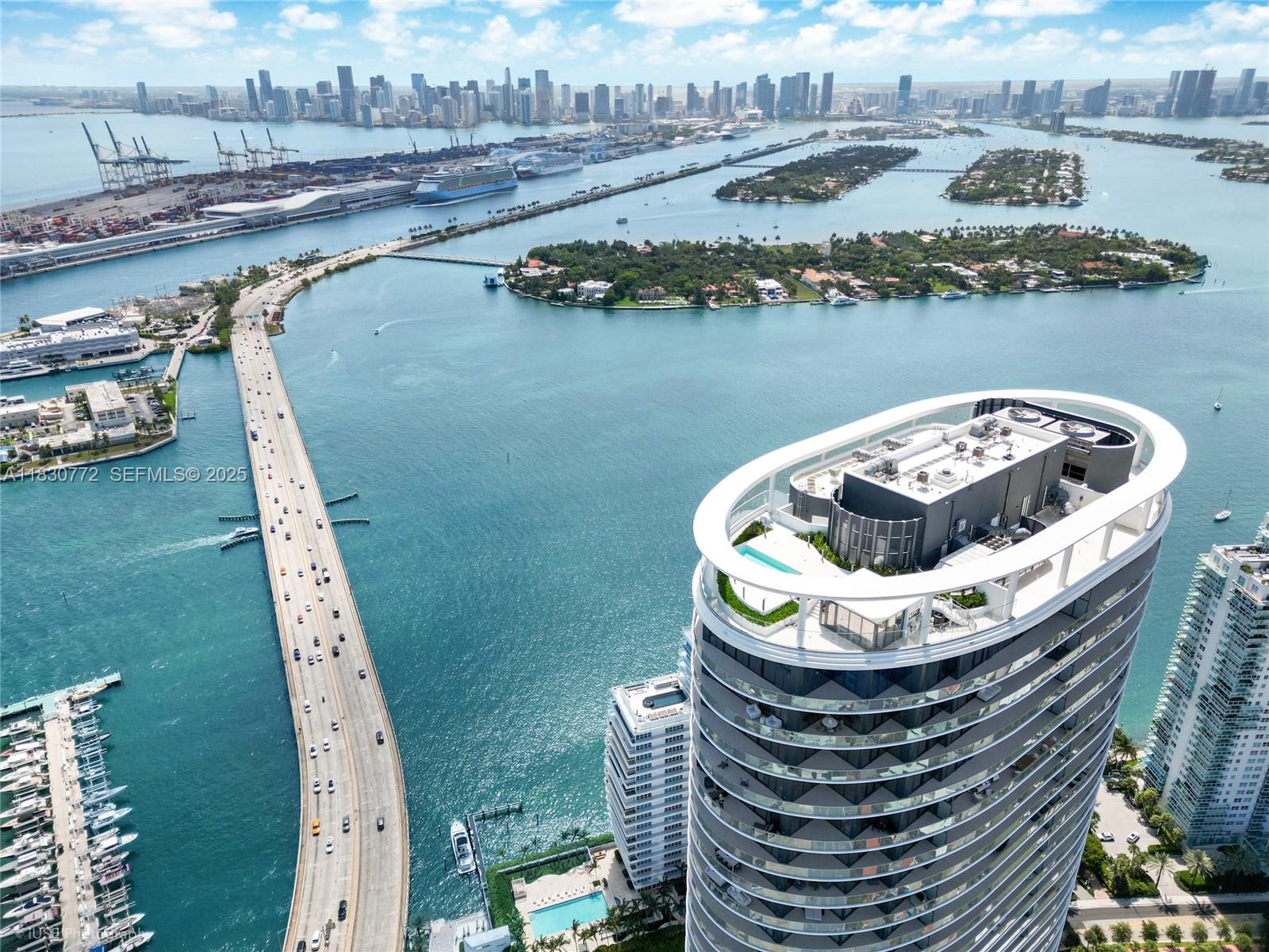 500 Alton Road, Unit 4401 Miami Beach, FL 33139 - Photo 25 of 34 a view of a lake in middle of the town