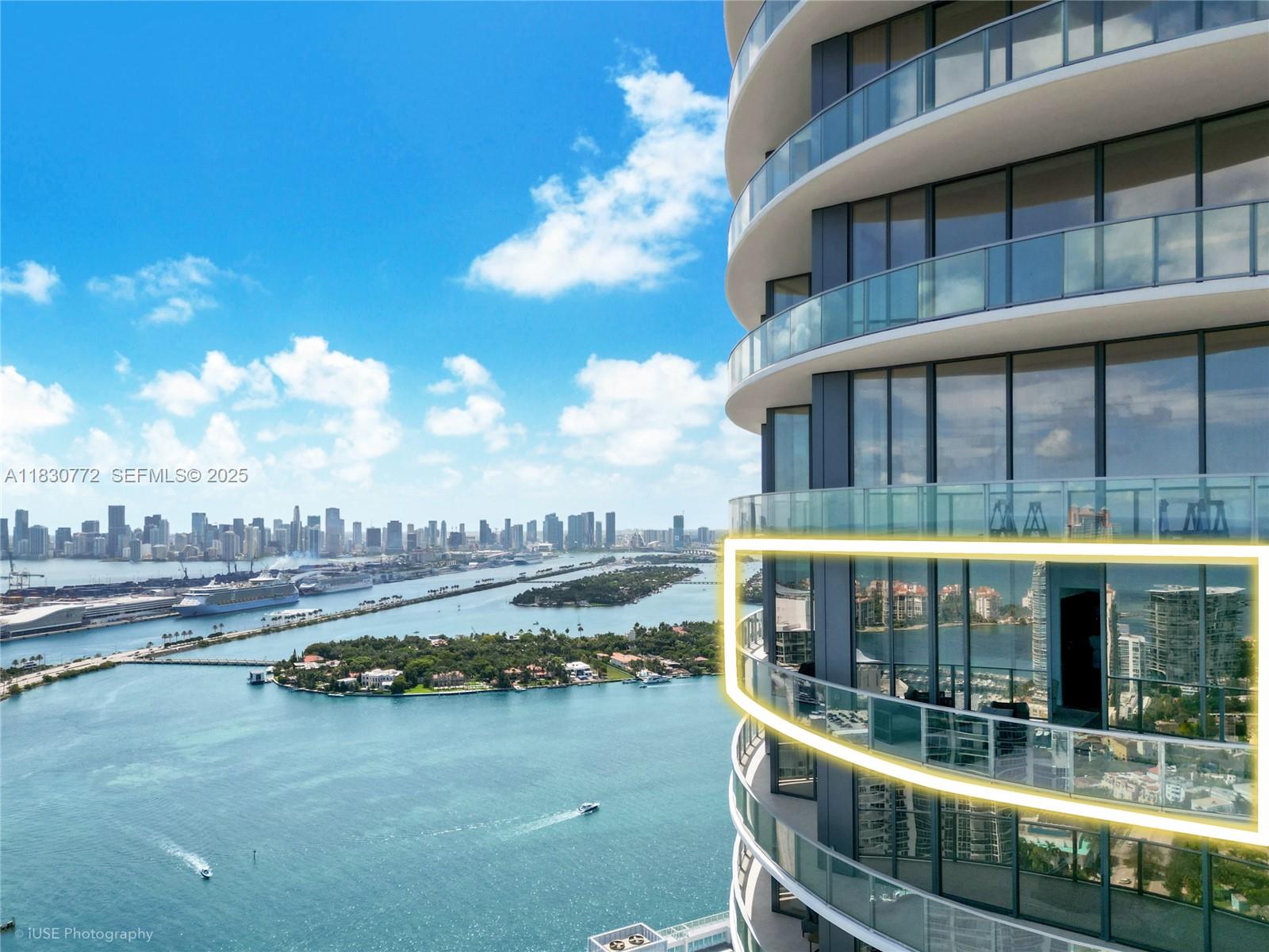 500 Alton Road, Unit 4401 Miami Beach, FL 33139 - Photo 26 of 34 a view of swimming pool with outdoor seating and plants