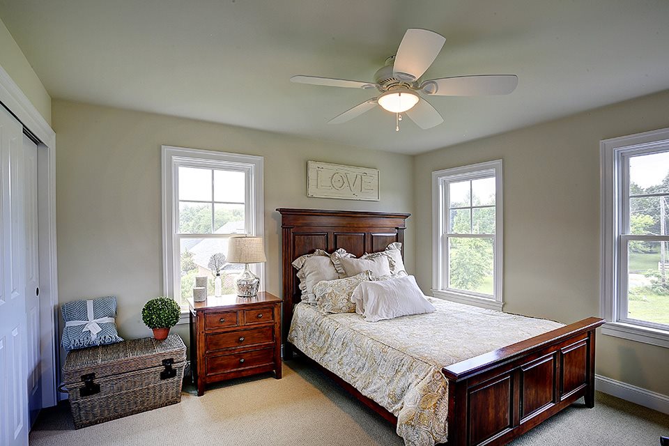 3437 Keswick Road Keswick, VA 22947 - Photo 15 of 19 a bedroom with a bed and windows