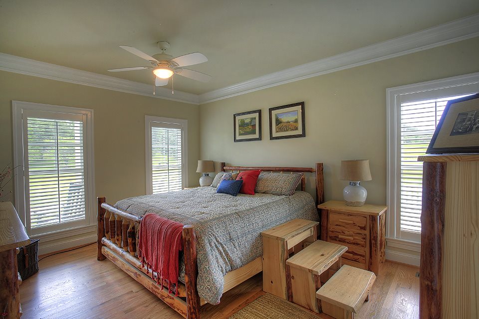 3437 Keswick Road Keswick, VA 22947 - Photo 10 of 19 a bedroom with a bed and window
