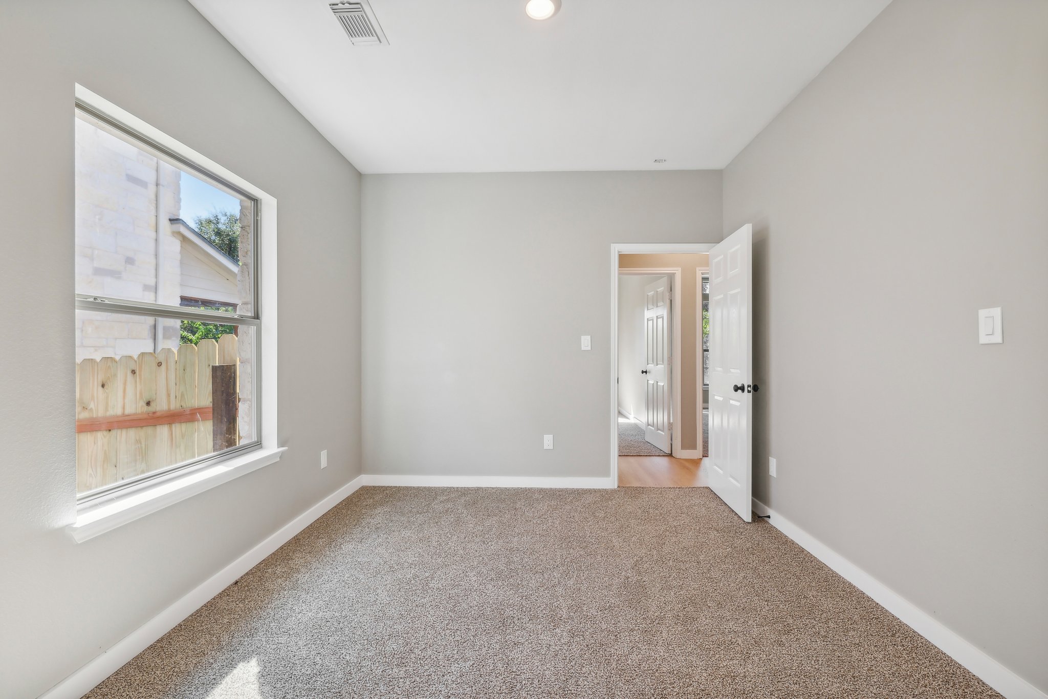 7324 Moon Rock Road Austin, TX 78739 - Photo 18 of 30 a view of an empty room with a window