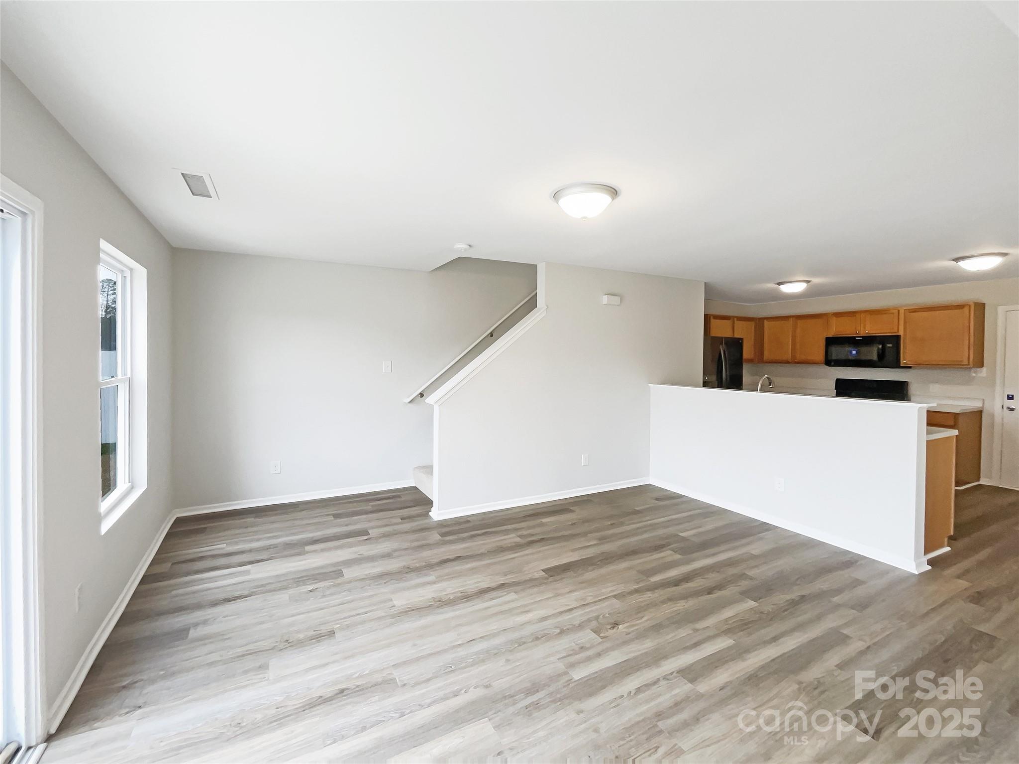 117 Hunter Park Drive York, SC 29745 - Photo 14 of 21 a view of a kitchen with wooden floor and a sink