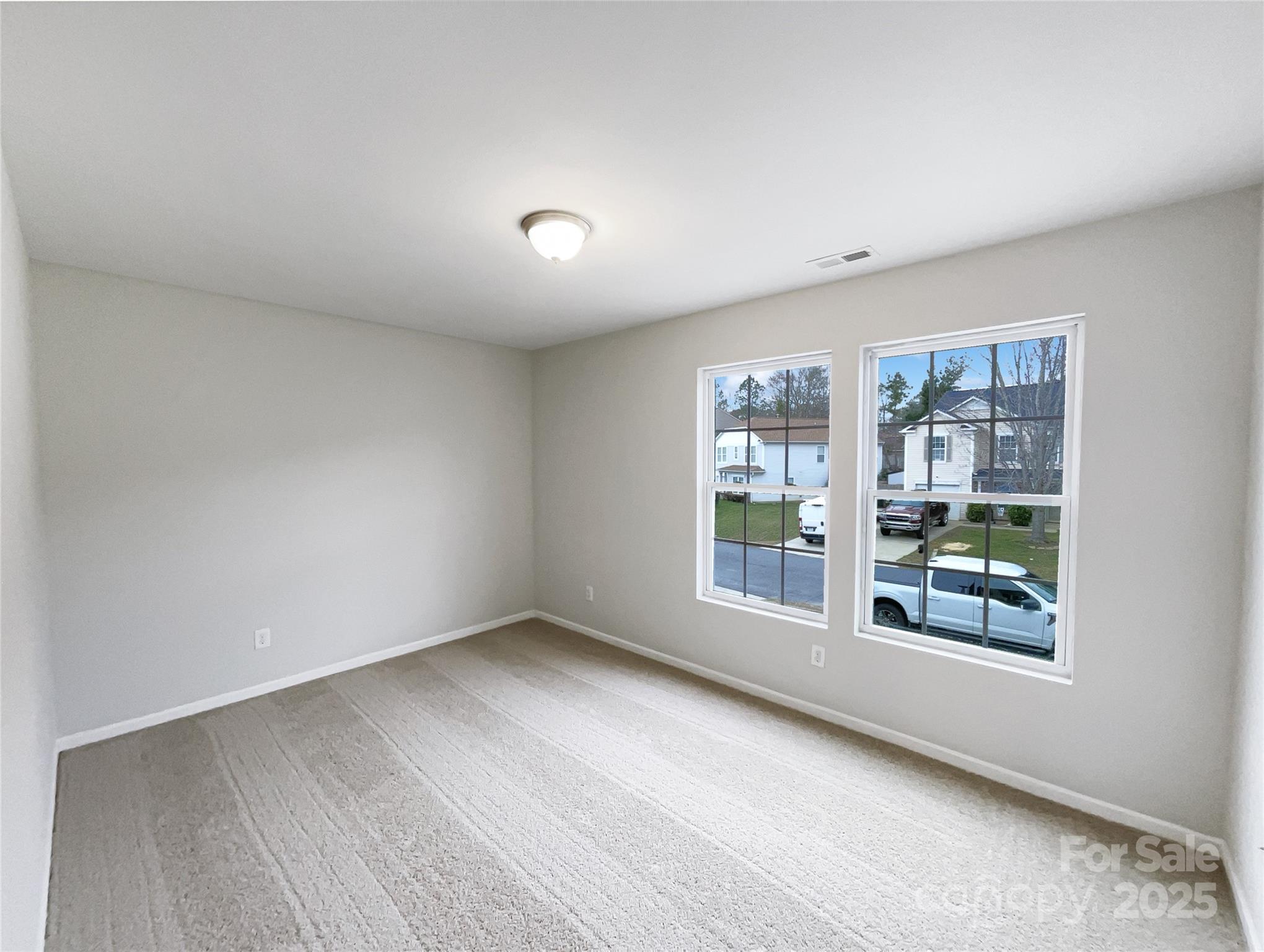 117 Hunter Park Drive York, SC 29745 - Photo 17 of 21 wooden floor in an empty room with a window