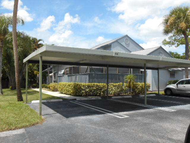 1102 Summerwinds Lane, Unit 1102 Jupiter, FL 33458 - Photo 20 of 21 Carport