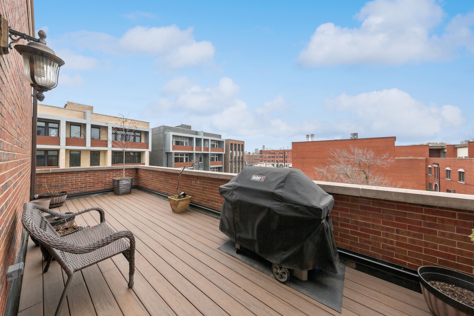 802 West Wolfram Street, Unit 3S Chicago, IL 60657 - Photo 17 of 18 a view of a terrace with chairs