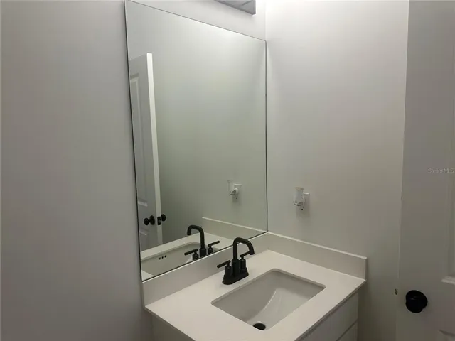 a bathroom with a shower and a toilet