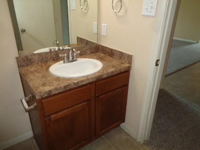 a bathroom with a glass shower
