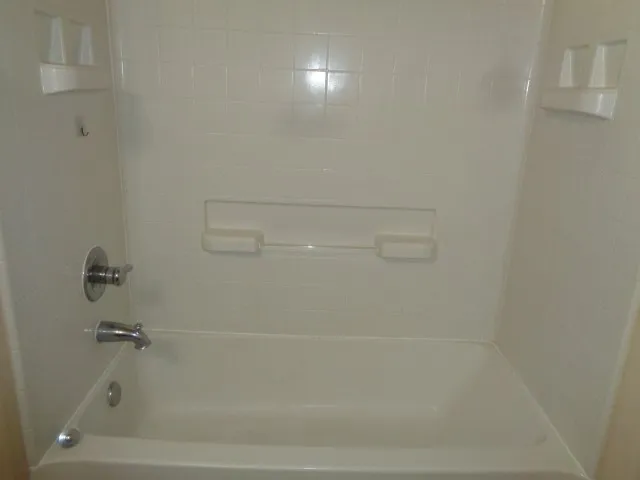 a view of empty room with windows