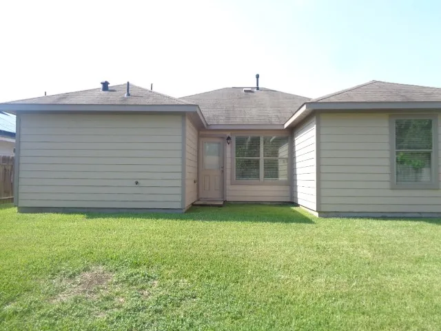 a view of a backyard with a garden