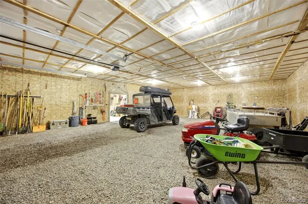 a view of a garage with furniture