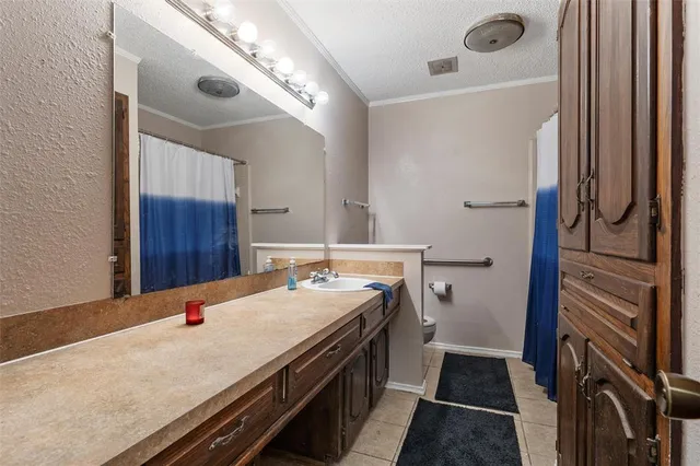 a room with a refrigerator and washer
