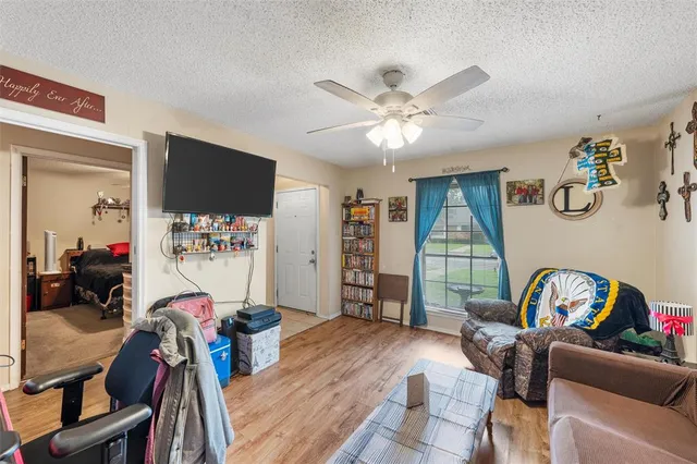 a view of a workspace with furniture and toys
