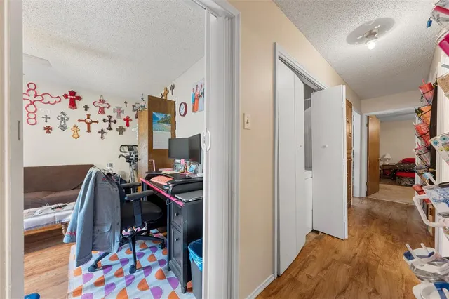 a open kitchen that has a lot of cabinets in it and appliances
