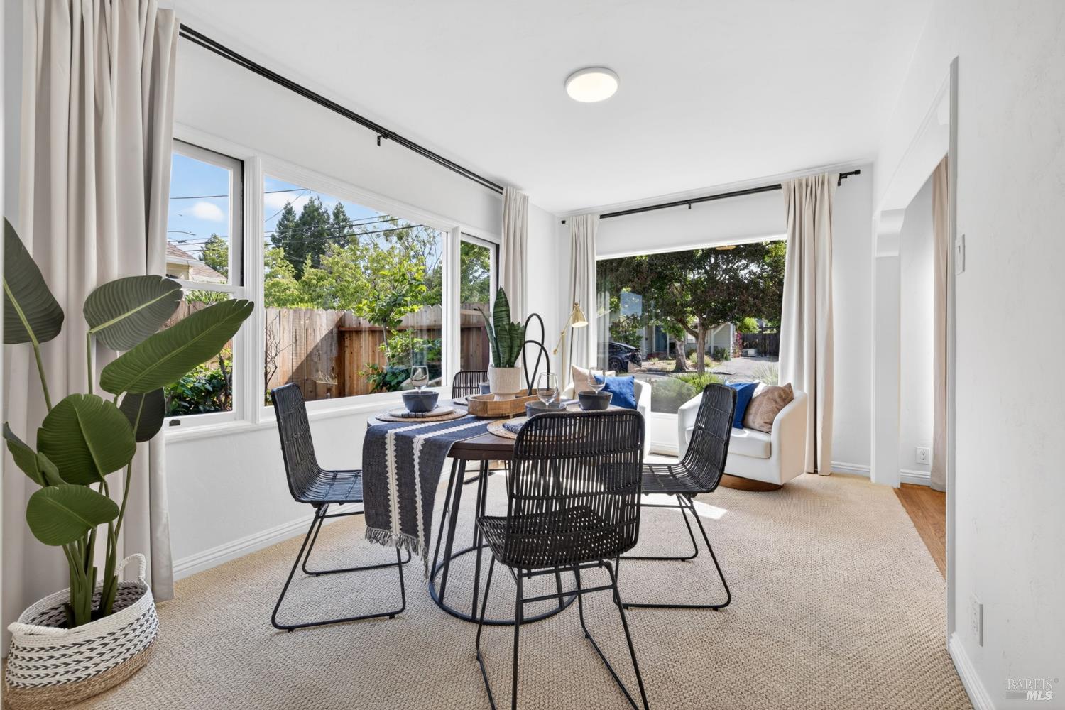 2211 Humboldt Street Santa Rosa, CA 95404 - Photo 13 of 52 a view of a dining room with furniture window and outside view