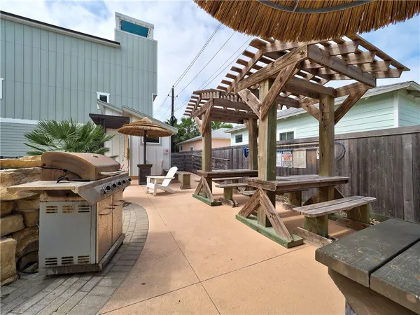 swimming pool view with a outdoor seating space
