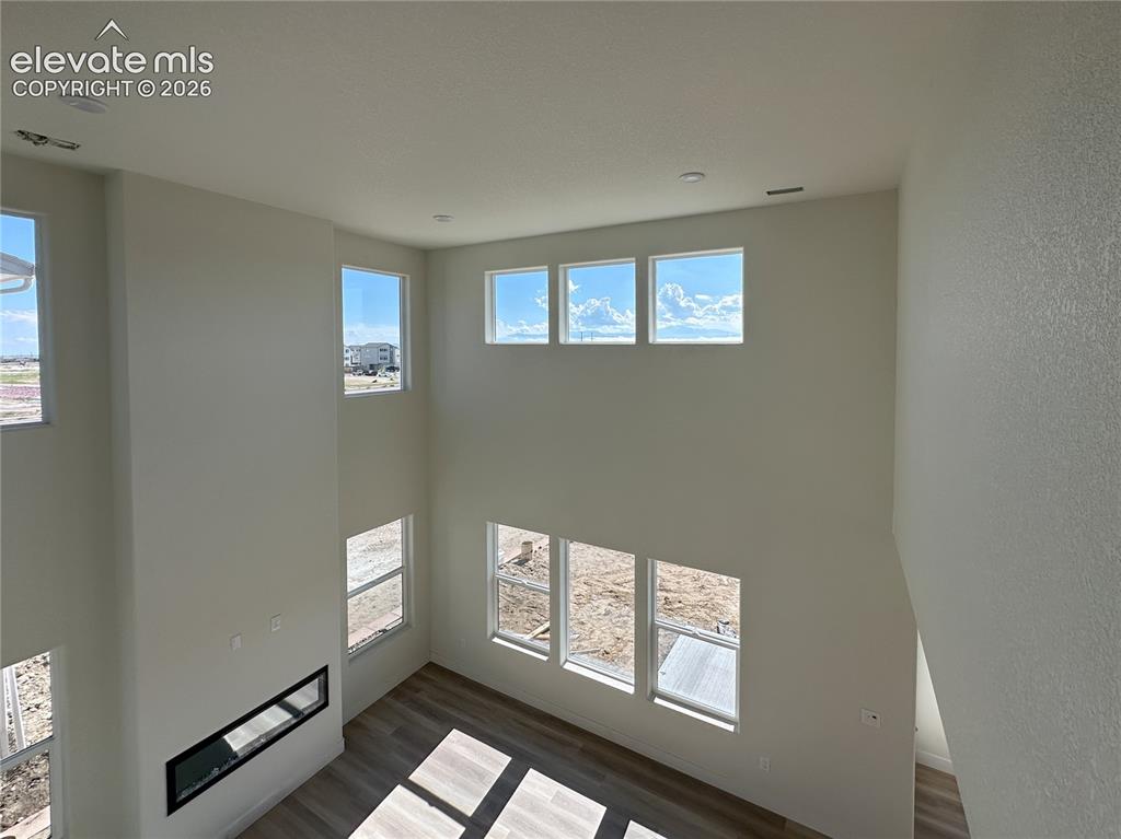8214 Lemon Grass Road Falcon, CO 80831 - Photo 37 of 41 Living room from second story