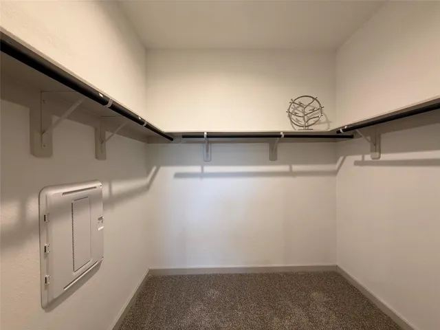 a bathroom with a double vanity sink a and a mirror