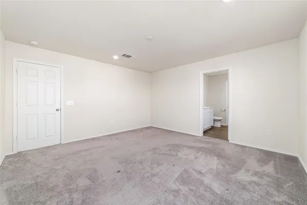an empty room with an entryway