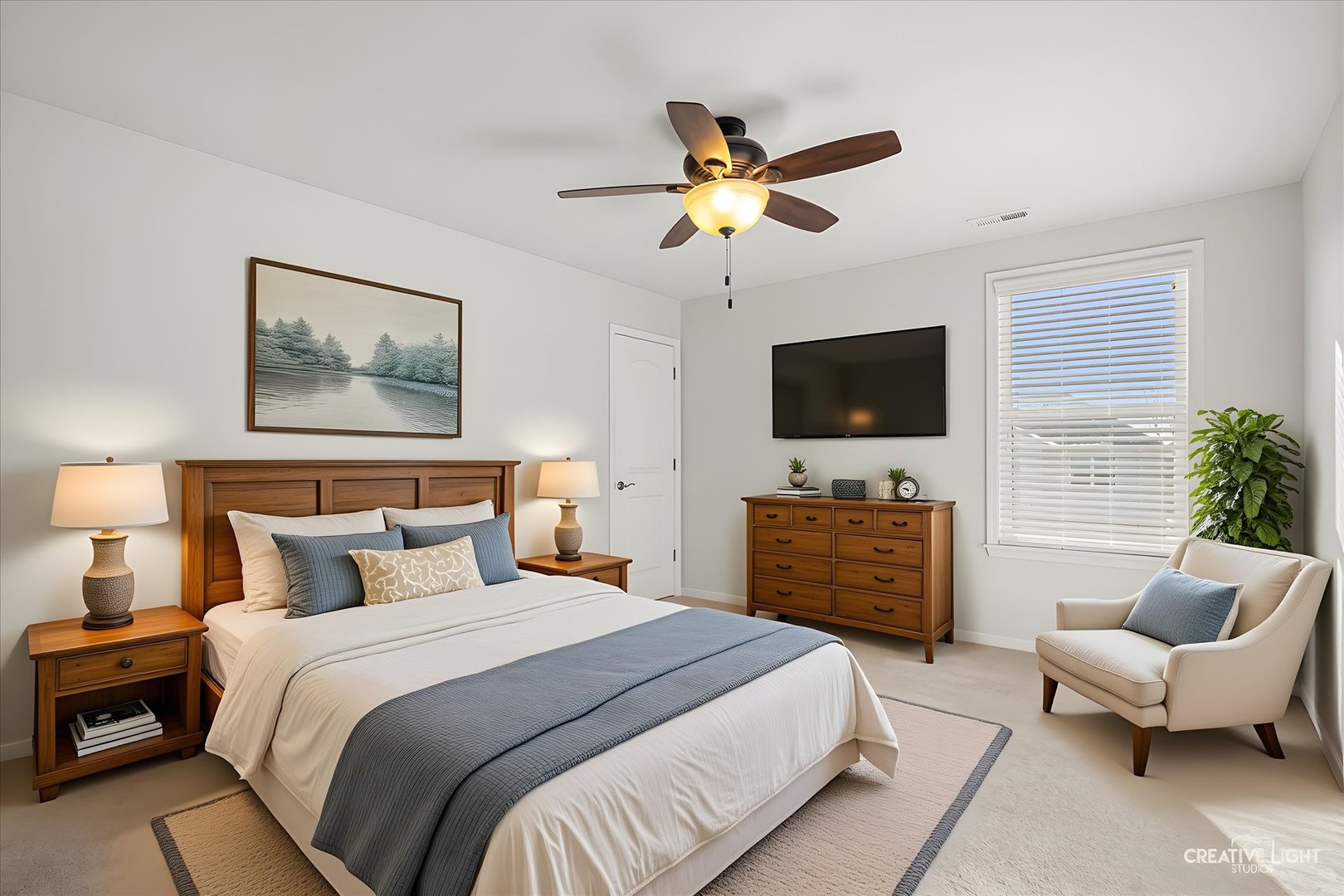 5332 Cedar Drive Naperville, IL 60564 - Photo 20 of 56 a bedroom with a bed and a flat screen tv