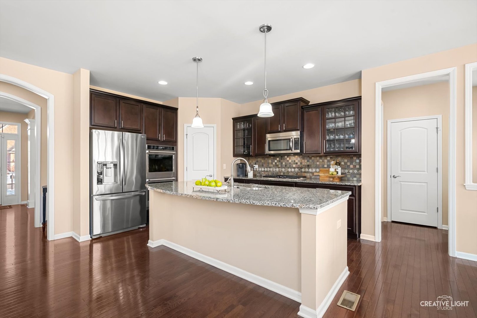 5332 Cedar Drive Naperville, IL 60564 - Photo 2 of 56 a kitchen with stainless steel appliances granite countertop a refrigerator and a stove top oven