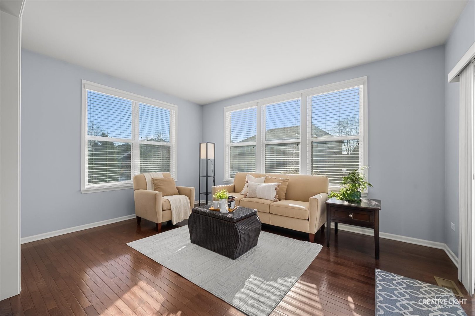 5332 Cedar Drive Naperville, IL 60564 - Photo 7 of 56 a living room with furniture and a large window