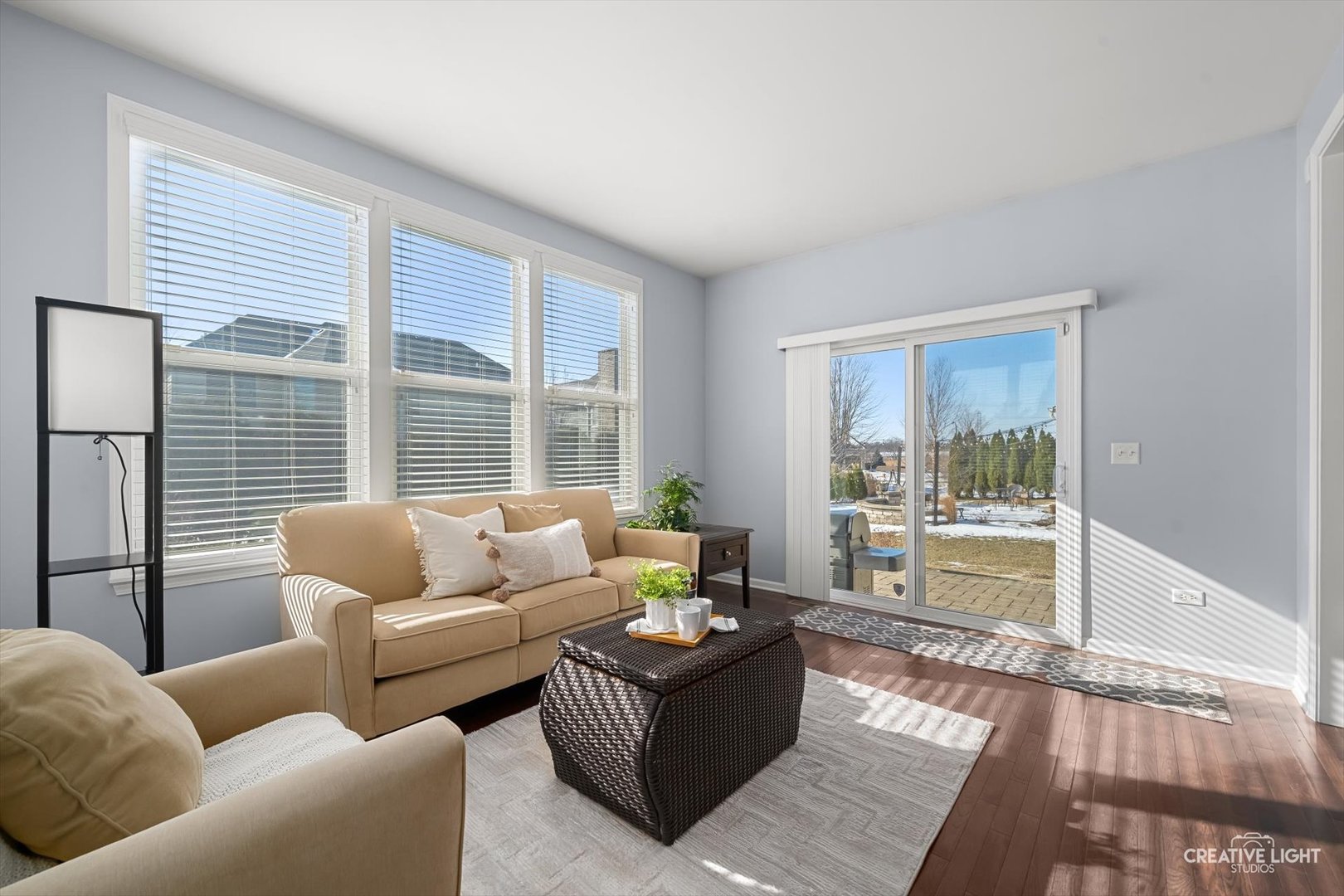5332 Cedar Drive Naperville, IL 60564 - Photo 8 of 56 a living room with furniture and a large window