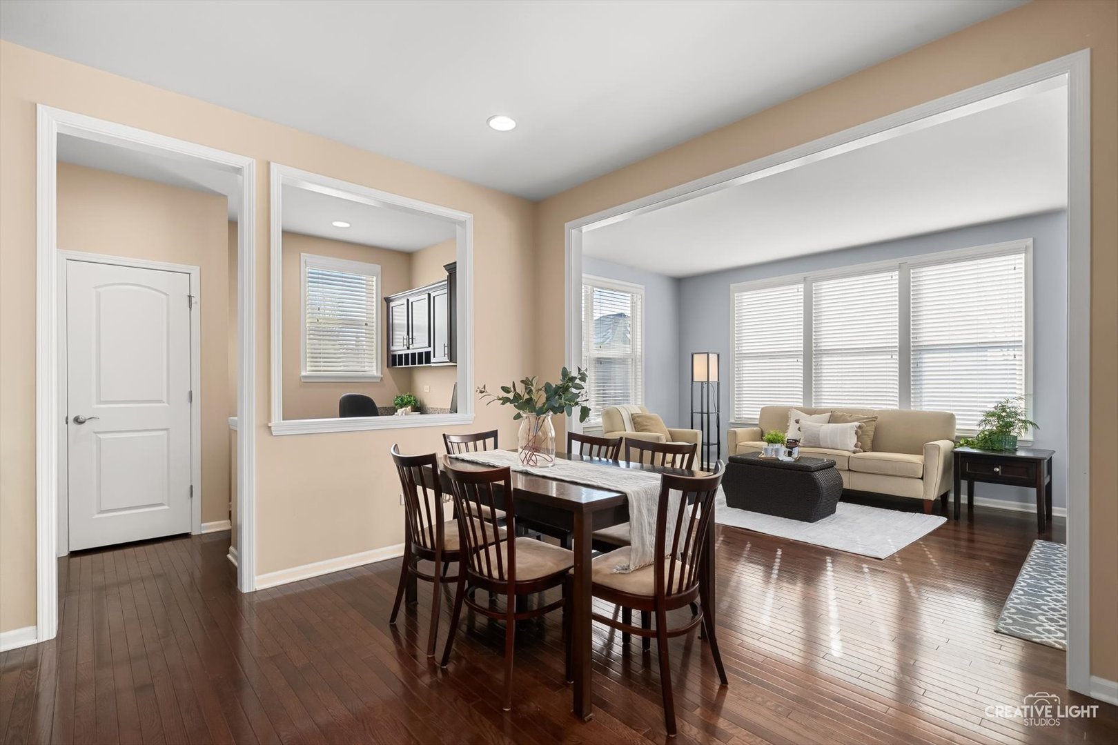 5332 Cedar Drive Naperville, IL 60564 - Photo 9 of 56 a view of a dining room with furniture window and wooden floor