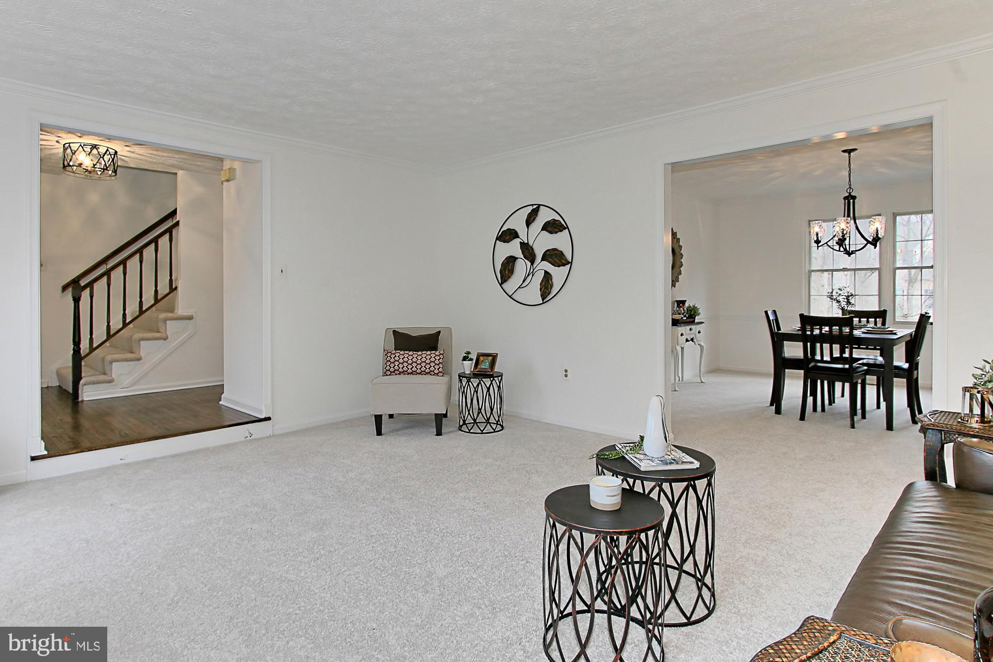 2211 Quartermaster Lane Reston, VA 20191 - Photo 21 of 49 Living Room Opens to Large Dining Room