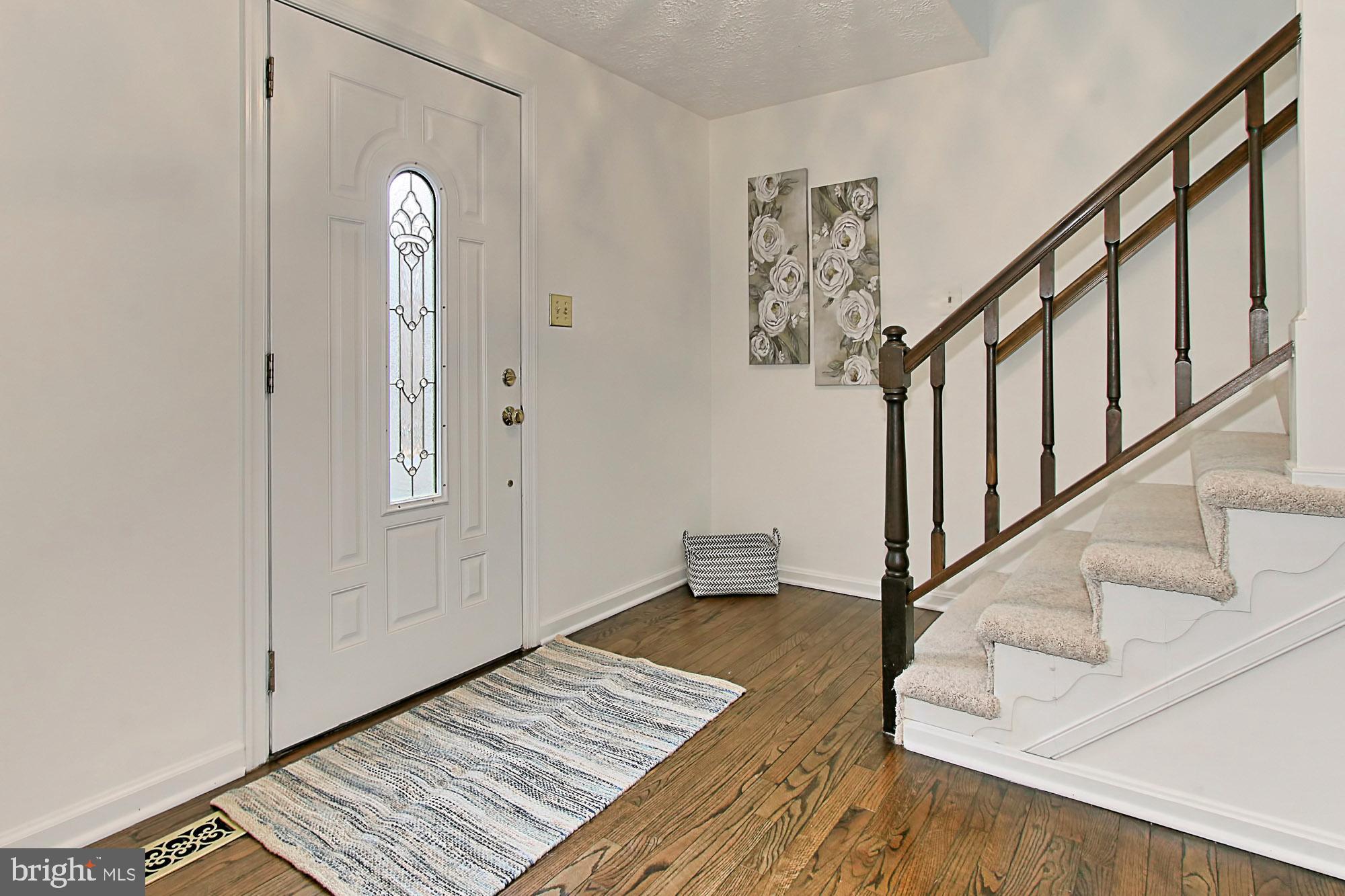 2211 Quartermaster Lane Reston, VA 20191 - Photo 23 of 49 Foyer with Renovated Wood Floors