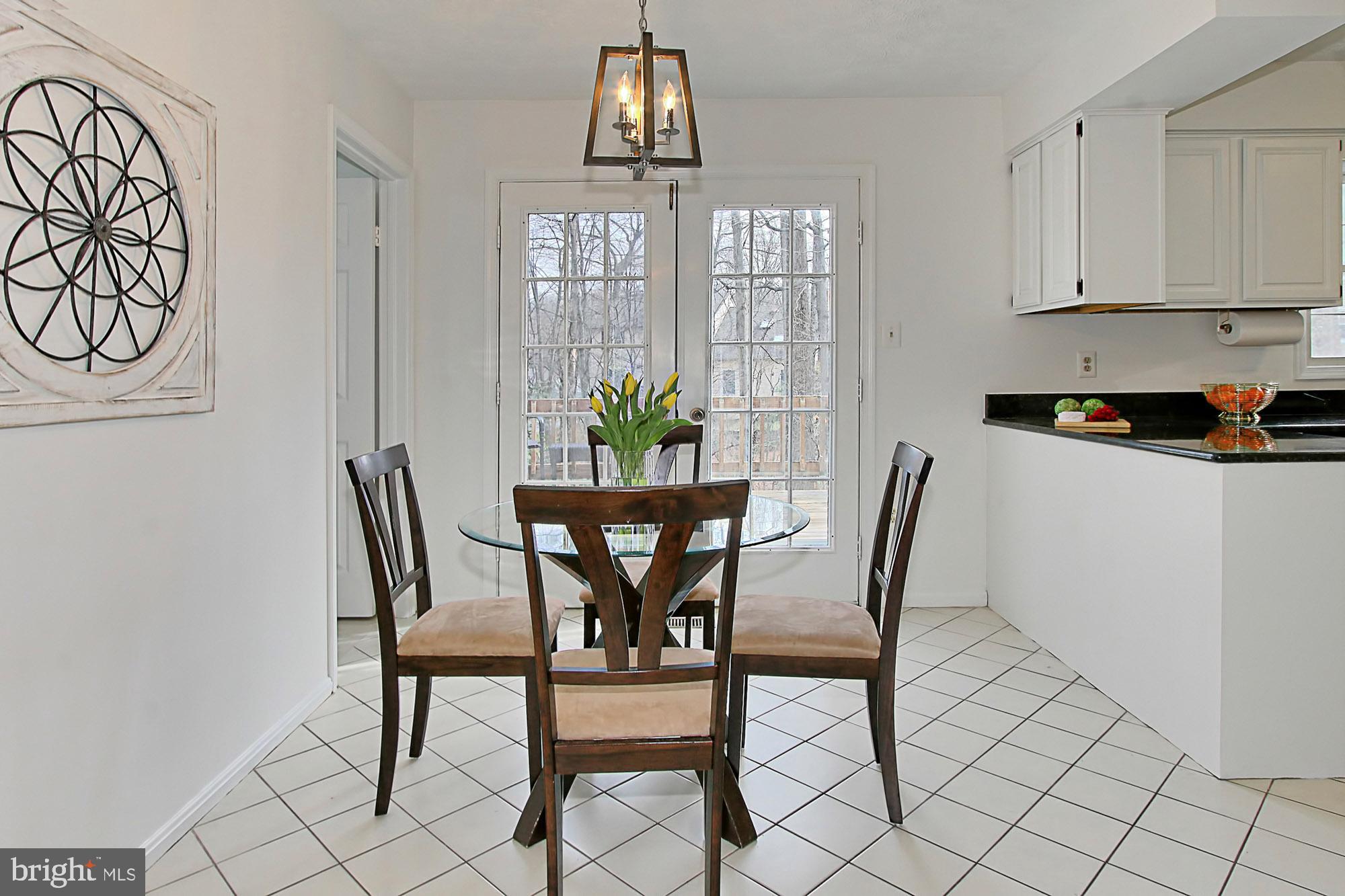 2211 Quartermaster Lane Reston, VA 20191 - Photo 10 of 49 Sunny Breakfast Area w/ French Doors to HUGE Dec