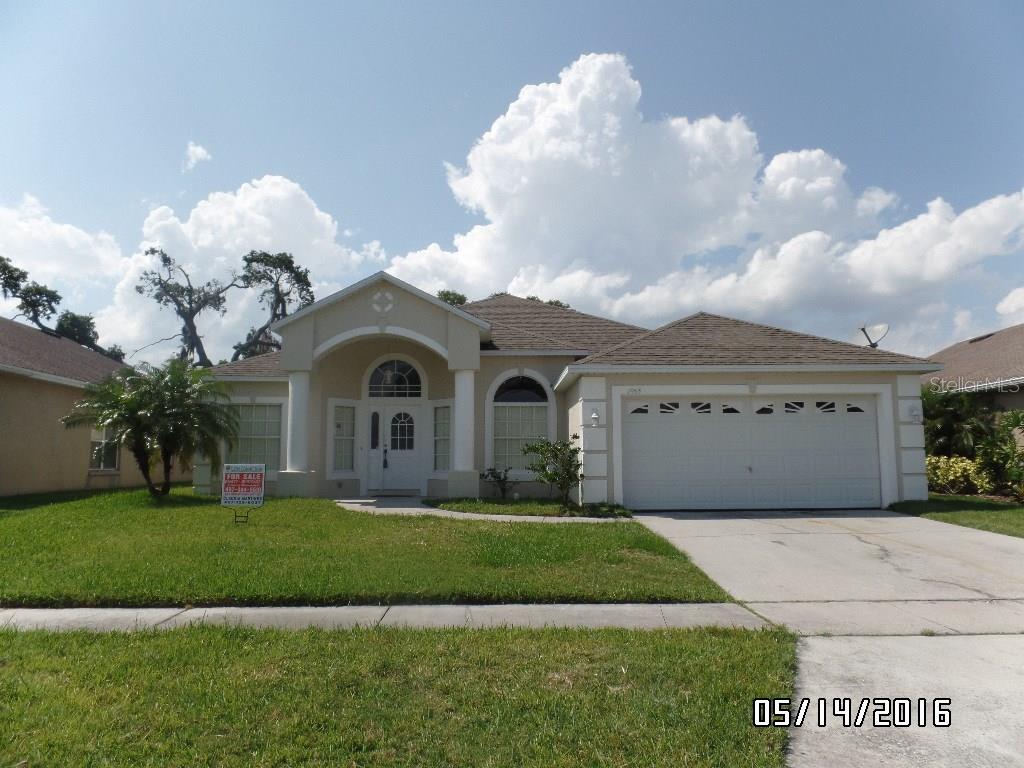 1933 Fairway Loop Kissimmee, FL 34746 - Photo 1 of 1 FRONT