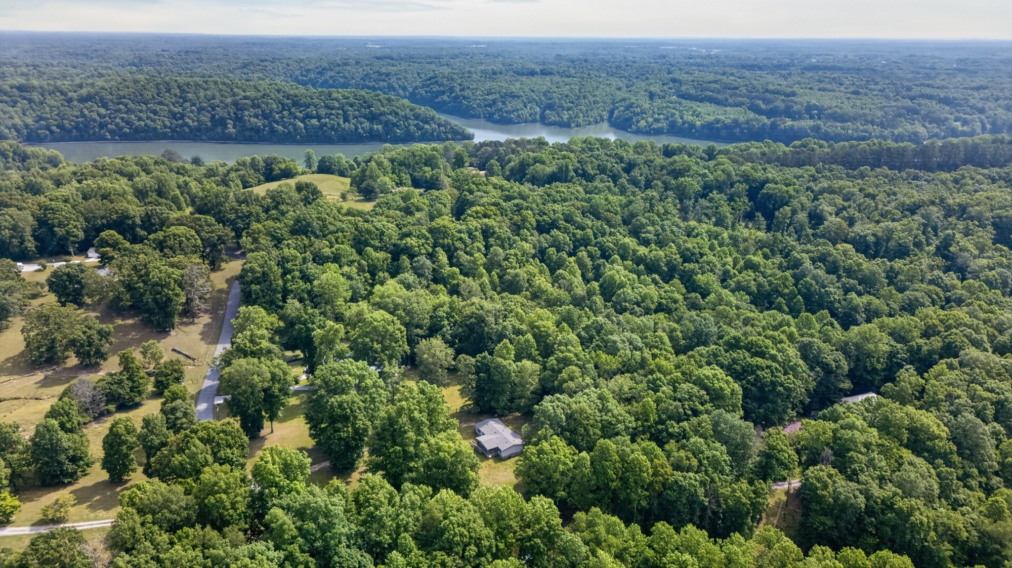 228 Shasteen Ridge Road Lynchburg, TN 37352 - Photo 48 of 53 a view of a and covered with lush green forest