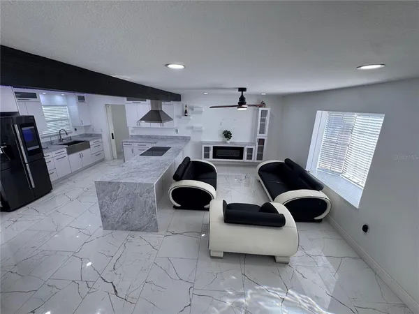 a view of entryway with wooden floor