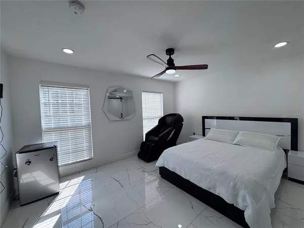 a view of a chandelier fan