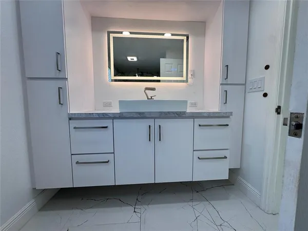 a bathroom with a shower and a toilet