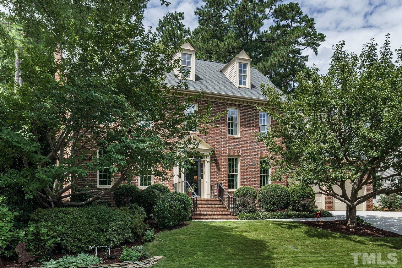 8601 Zinfandel Place Raleigh, NC 27615 - Photo 2 of 29 front view of a house with a yard