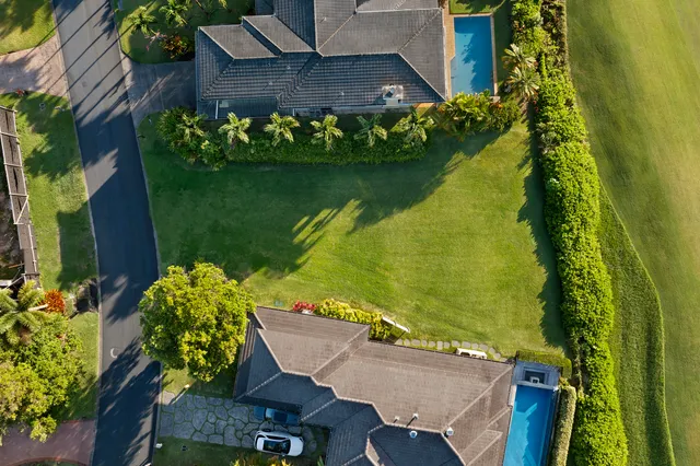 an aerial view of a garden with an outdoor seating