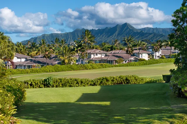 a view of a building with a big yard
