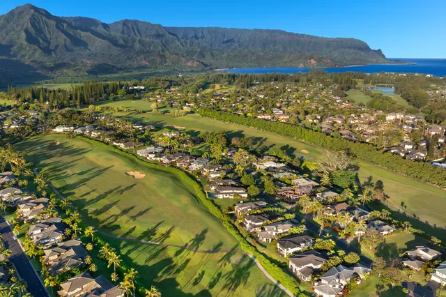 a view of residential houses with outdoor space