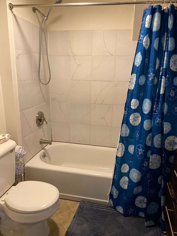 8 May Street Beverly, MA 01915 - Photo 16 of 25 a bathroom with a toilet and a shower