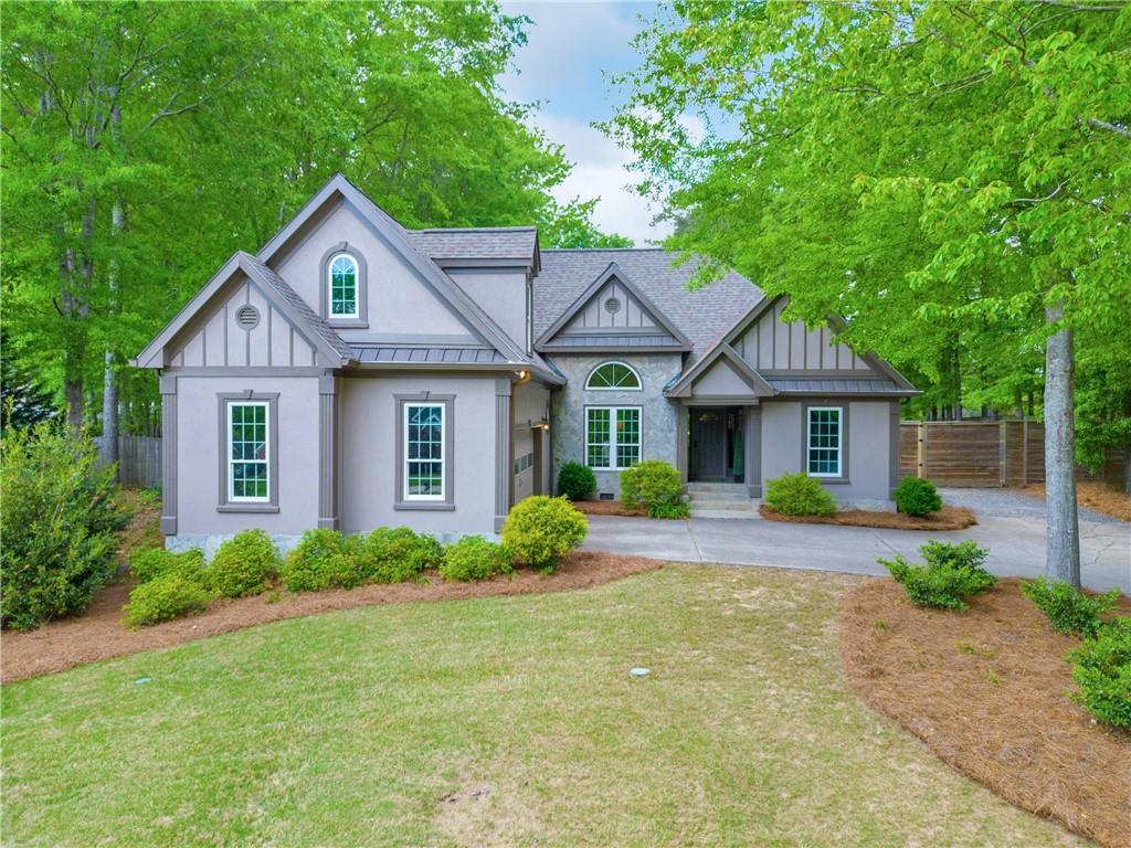 2017 Windfield Drive Monroe, GA 30655 - Photo 1 of 1 a front view of a house with garden