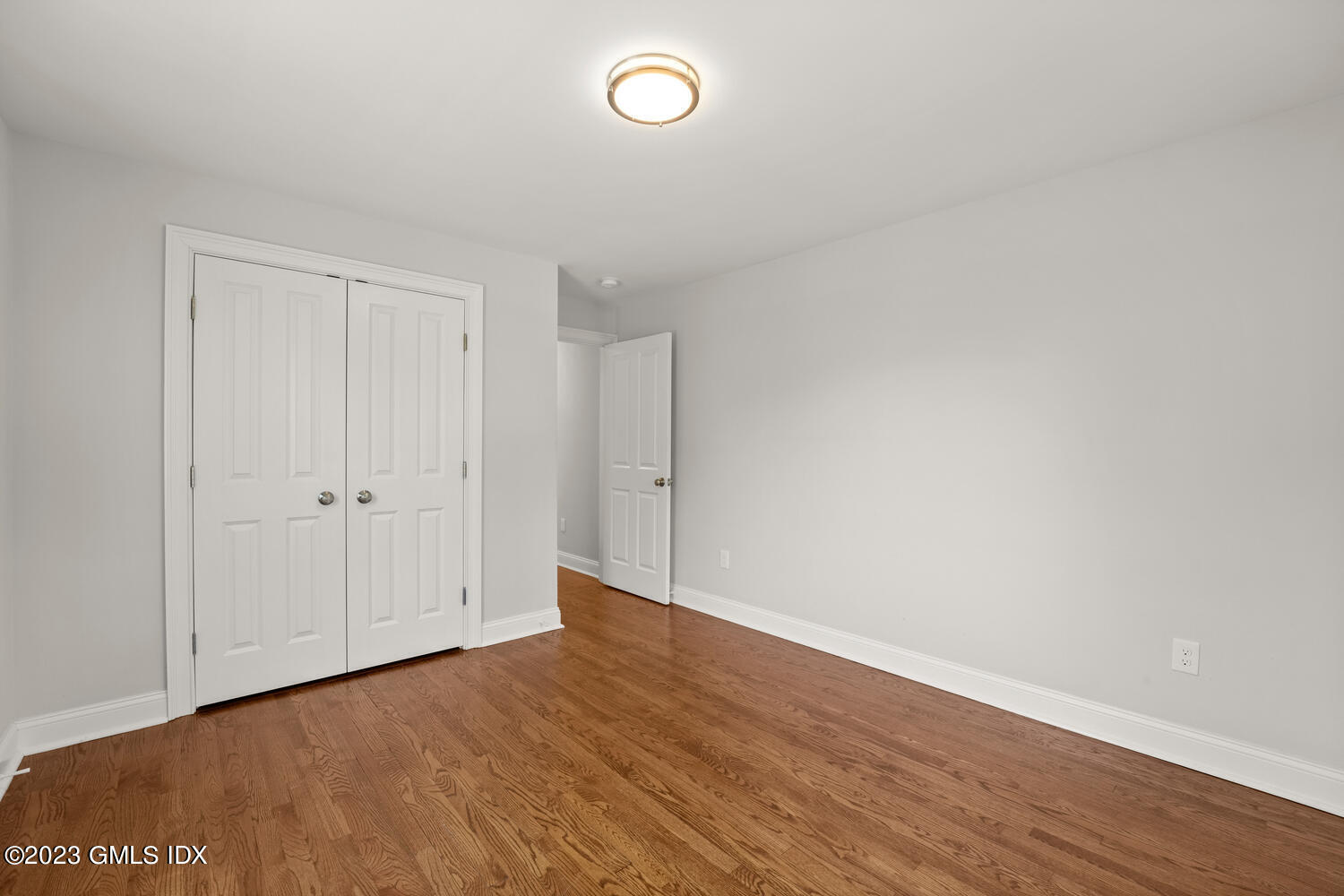 36 Sheep Hill Road Riverside, CT 06878 - Photo 12 of 37 a view of an empty room with wooden floor