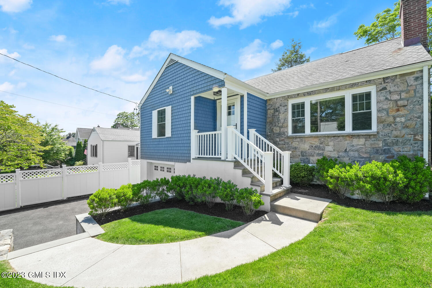 36 Sheep Hill Road Riverside, CT 06878 - Photo 2 of 37 a front view of a house with a yard