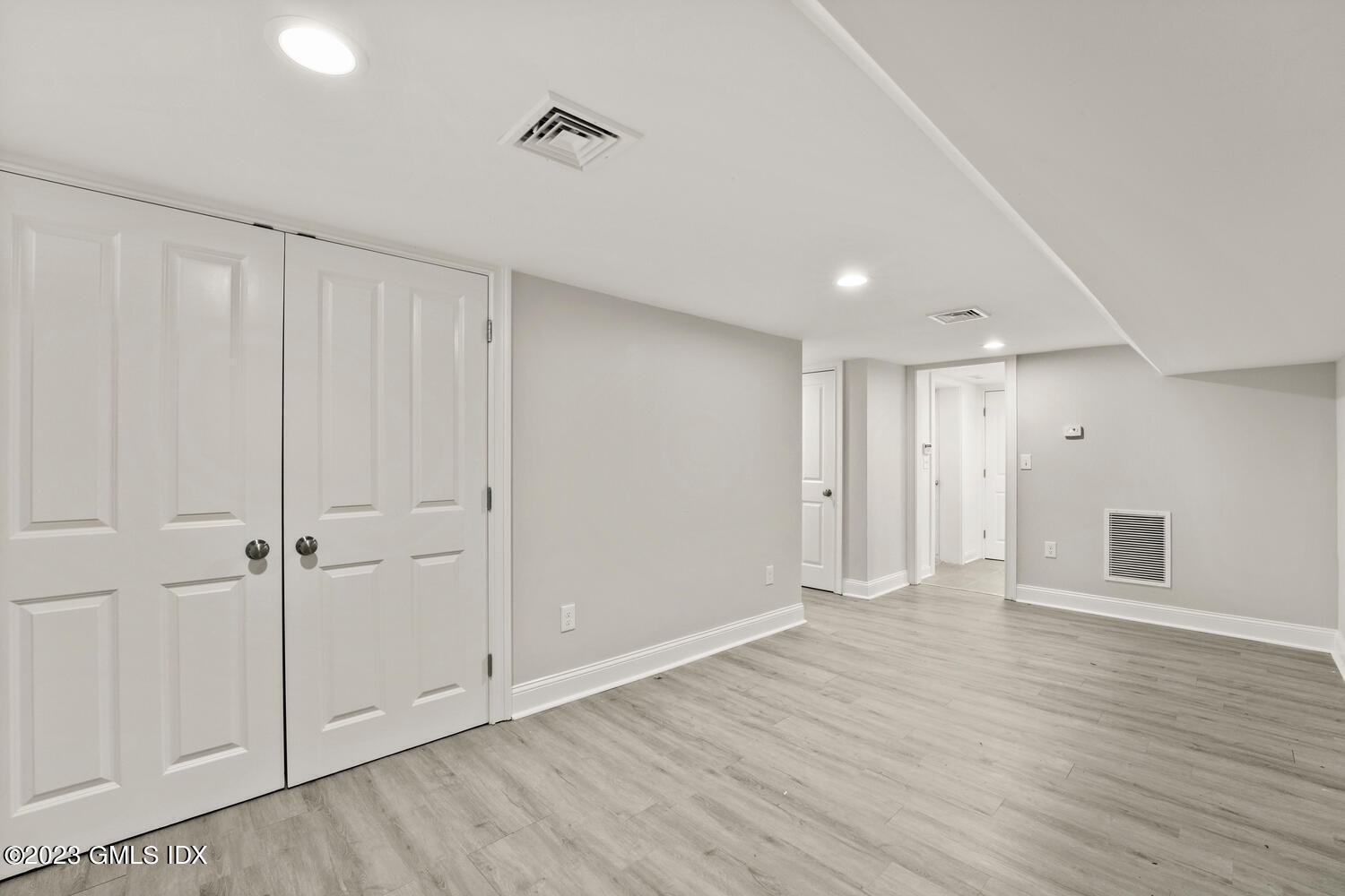 36 Sheep Hill Road Riverside, CT 06878 - Photo 27 of 37 a view of an empty room with wooden floor