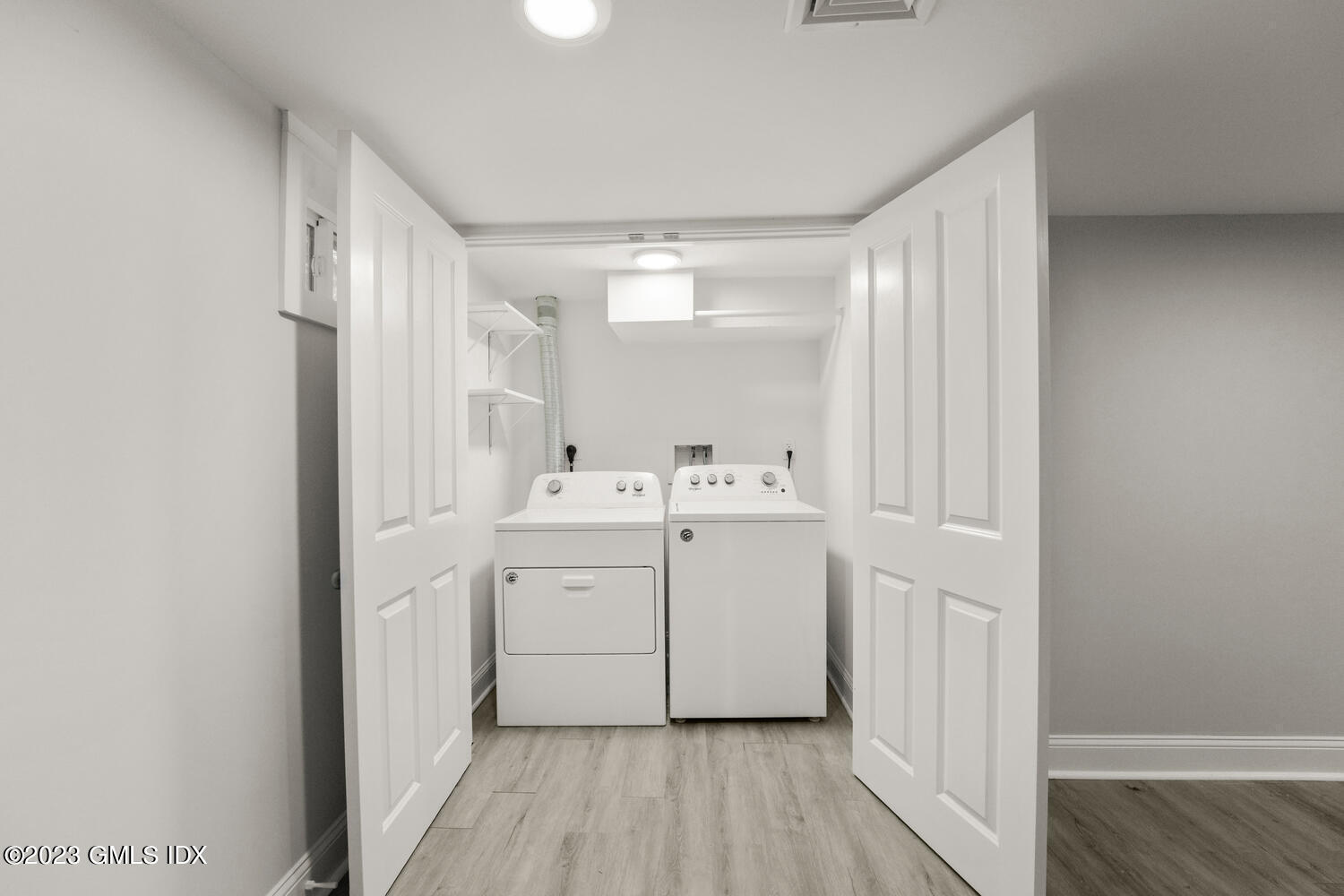 36 Sheep Hill Road Riverside, CT 06878 - Photo 29 of 37 a utility room with cabinets washer and dryer